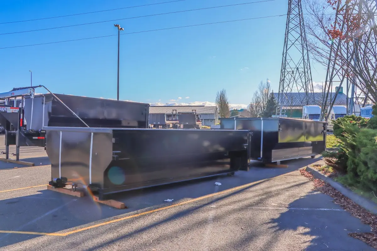 Roll-off dumpster ready for waste disposal at job site for Roll Off Dumpster Rental in Springville